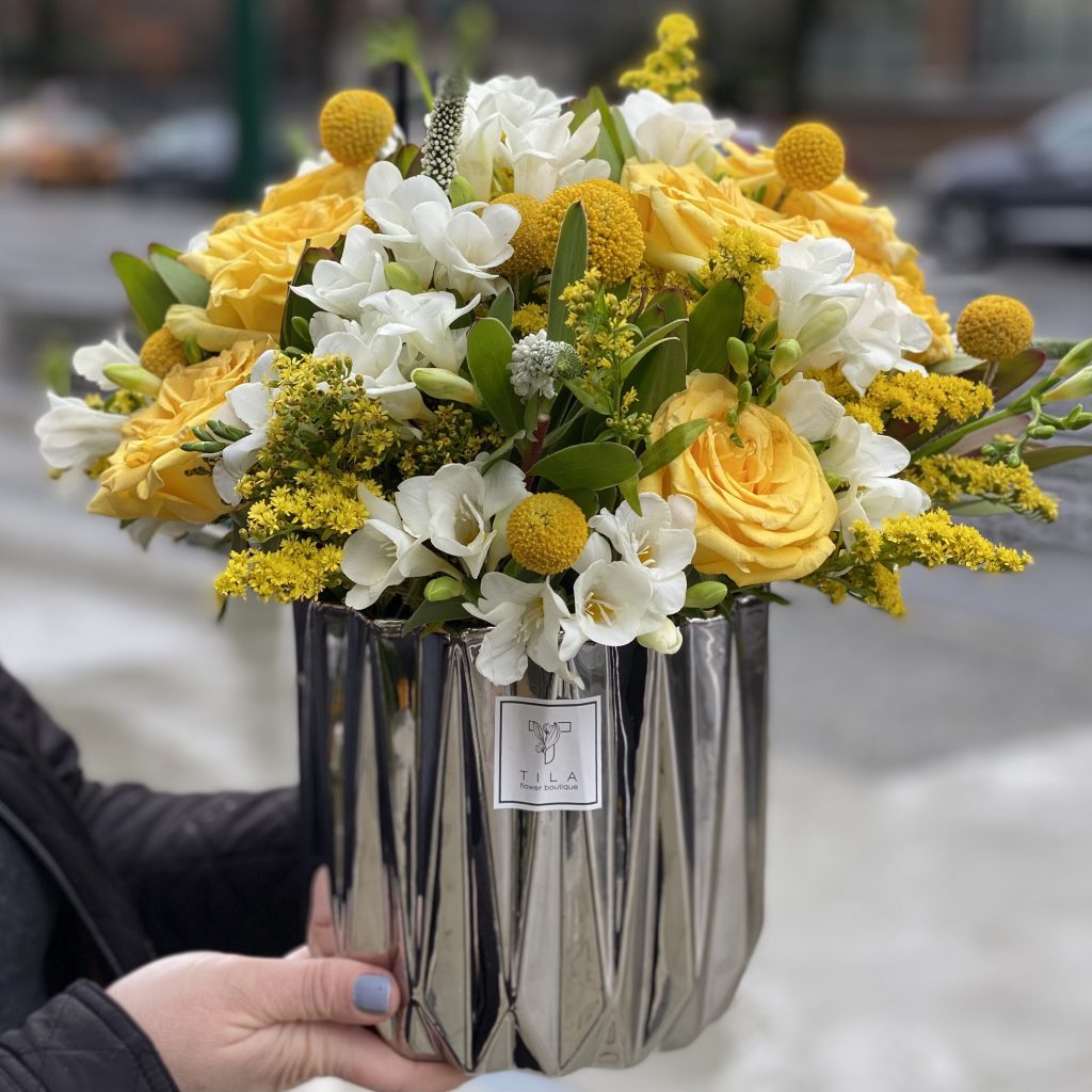 yellow flower silver pot in Vancouver